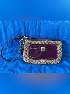 Coach Beige Signature Canvas Wristlet with Plum Leather Trim